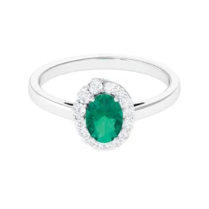 1.25 CT Oval Emerald and Diamond Halo Engagement Ring