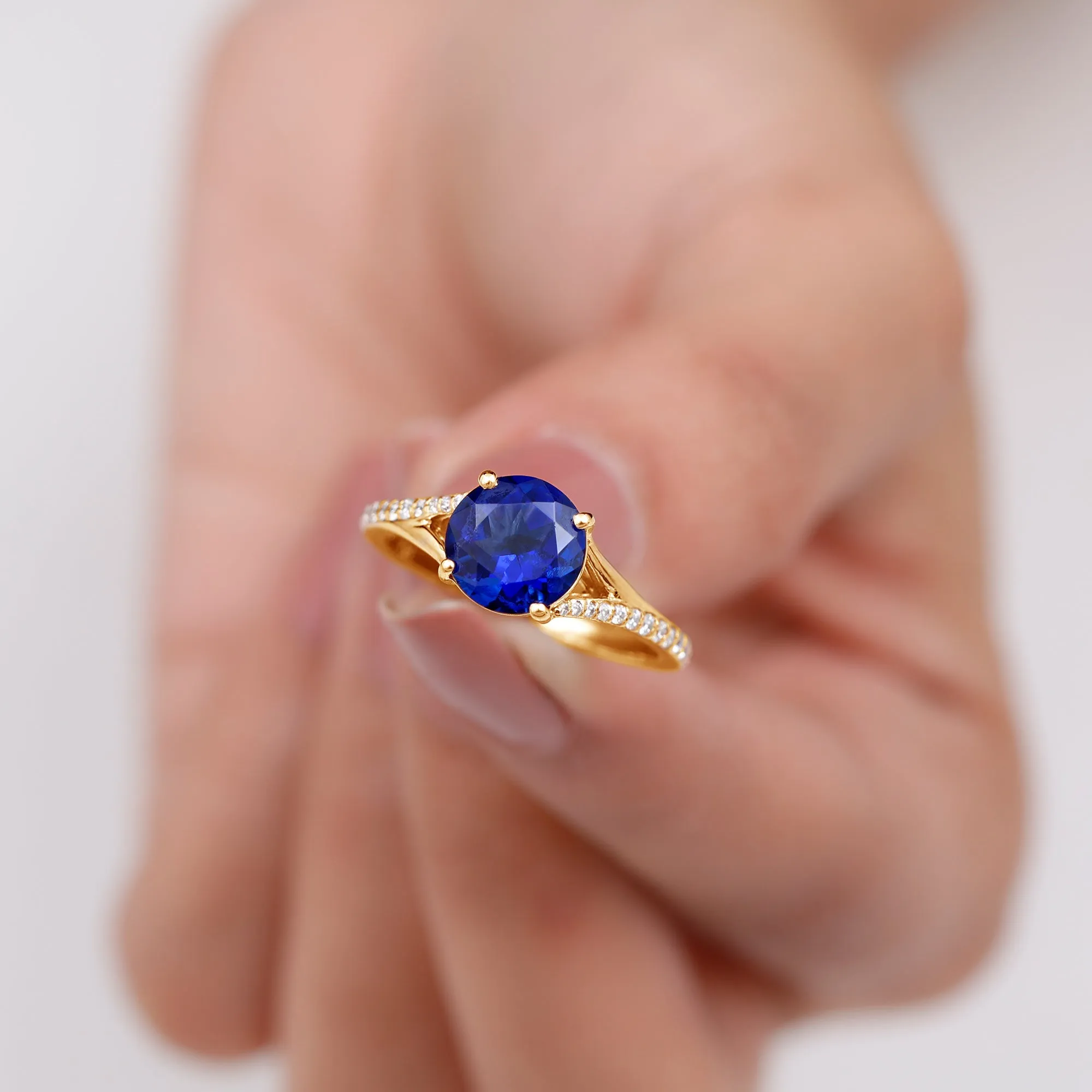 2.25 CT Lab Created Blue Sapphire Solitaire Ring with Diamond Side Stones