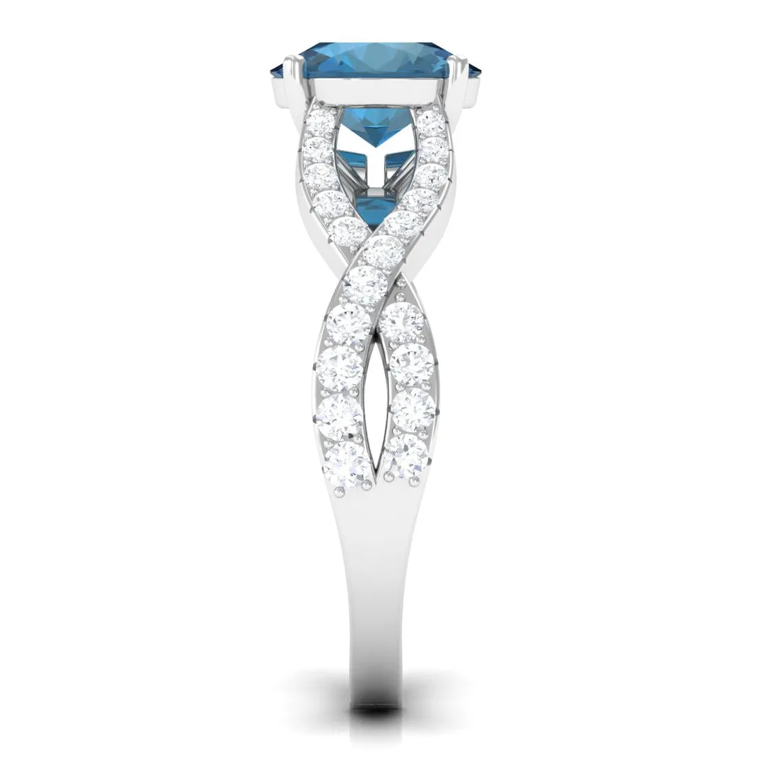 4 Prong Set Solitaire London Blue Topaz Crossover Ring with Diamond Accent