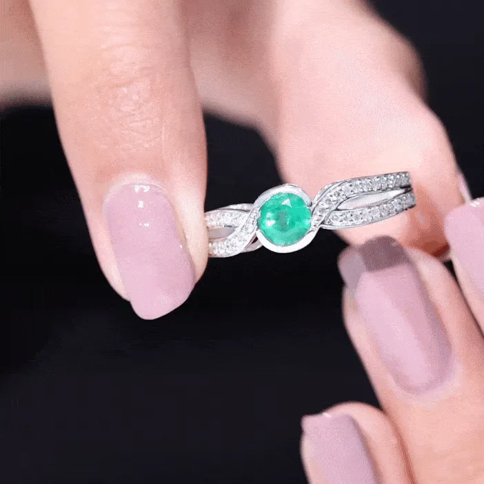 Emerald and Diamond Solitaire Bypass Ring