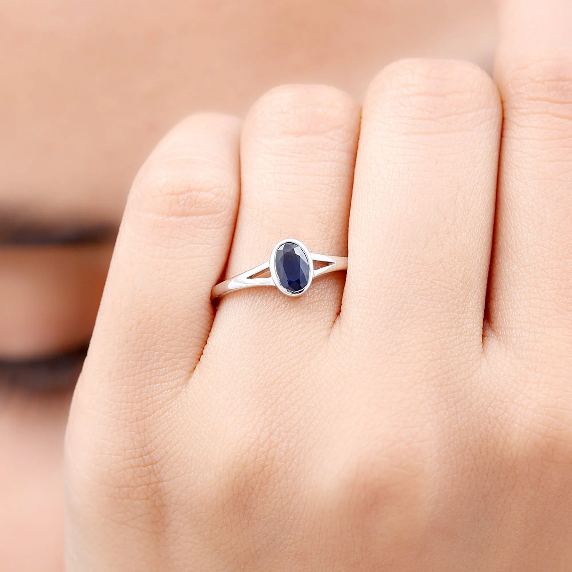 Oval Blue Sapphire Solitaire Engagement Ring in Split Shank