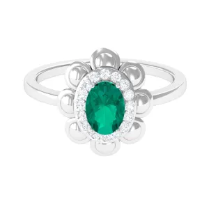 Oval Shape Emerald Flower Engagement Ring with Diamond Halo