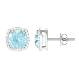 Sky Blue Topaz and Diamond Halo Stud Earrings